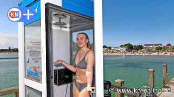 Großenbrode: Telefonzelle wird zur Spooßdusch-Dusche auf der Seebrücke