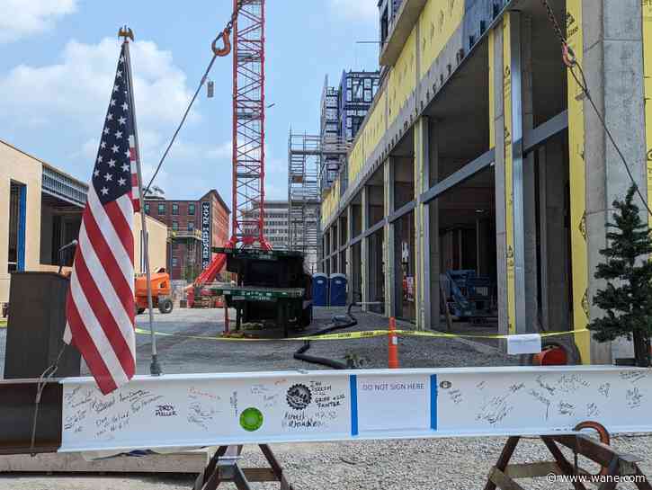 Topping off ceremony at 'The Pearl' marks midpoint of construction