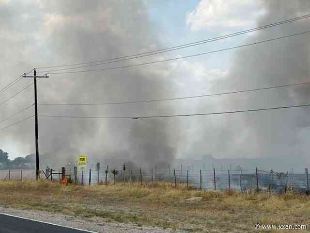 Buda wildfire under control, officials say