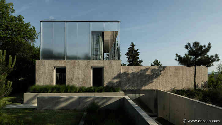 Limestone plinth supports Hungarian holiday home by Kontextus Architecture Studio
