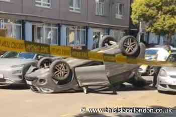 Car overturns in Canary Wharf after parked vehicles smash