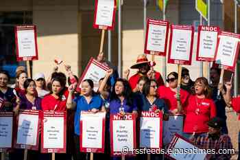 Nurses stage an informational picket for patient safety and a fair contract