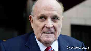 Former Trump lawyer Rudy Giuliani surrenders in Georgia election case