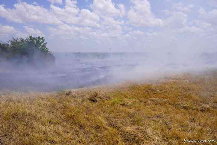 Crews contain brush fire caused by unapproved burning on private property