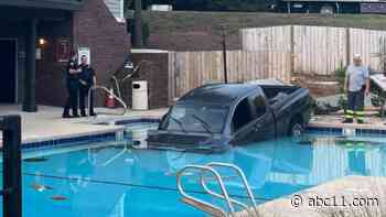 Man crashes truck into Cary apartment community pool after hit-and-run