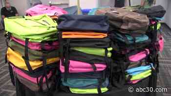 Project Student A.I.D.E. partners with FUSD for 1,000 backpack giveaway