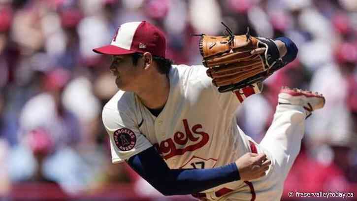 Shohei Ohtani won’t pitch for rest of season because of a tear in an elbow ligament, Angels GM says