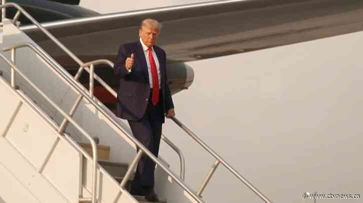 Trump arrives at Atlanta jail to surrender on charges he tried to overturn his 2020 election loss