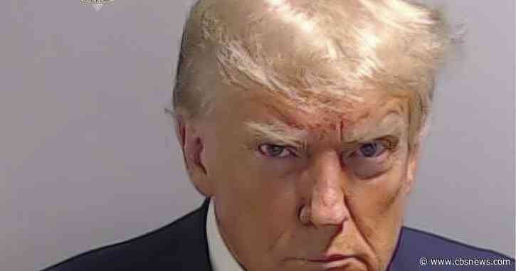 Mug shot of Donald Trump at Atlanta jail shows scowling former president