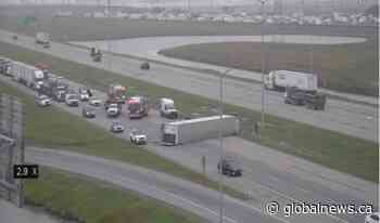Semi-truck on its side after multi-vehicle incident on Stoney Trail in Calgary