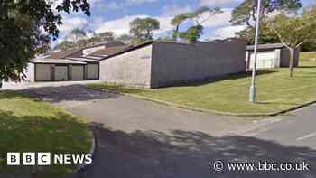 Two people injured by masked burglars