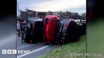 Farningham: Transporter carrying luxury sports cars overturns