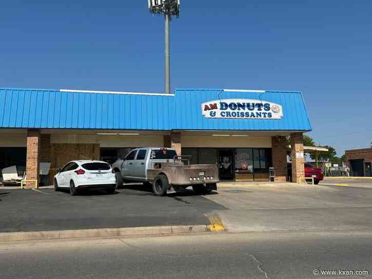 VIDEO: Car crashes through Texas donut shop, narrowly misses customer