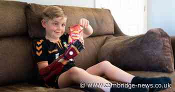 Cambs boy born without a hand gets to grips with new 'robot arm'
