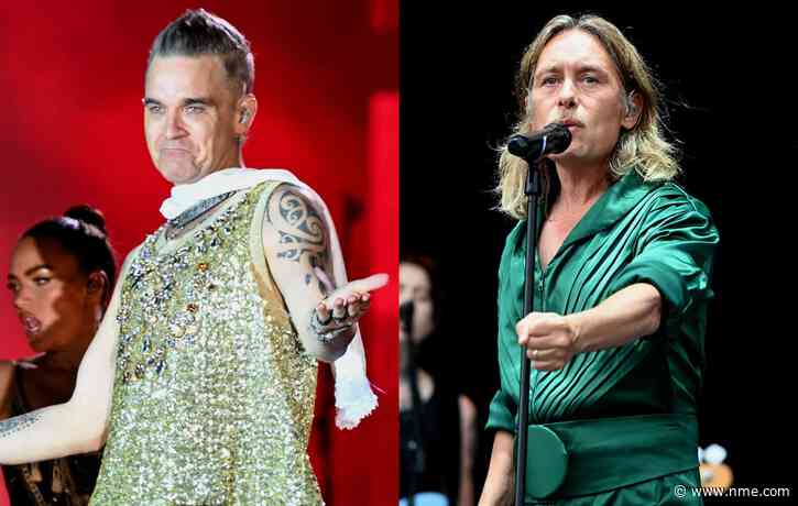 Watch Robbie Williams reunite onstage with former Take That bandmate Mark Owen
