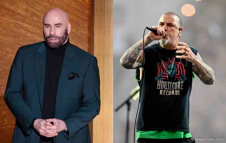 John Travolta hangs out with Pantera at a Metallica gig