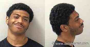 2 charged with shooting man to death in Elgin