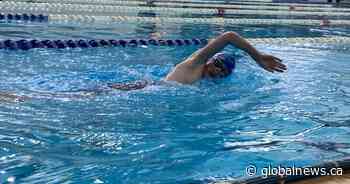 Calgary boy does ‘amazing’ fundraising swim for Canadian Cancer Society