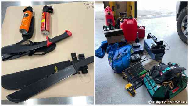 Stolen tools, stolen identification and weapons seized in Cochrane bust