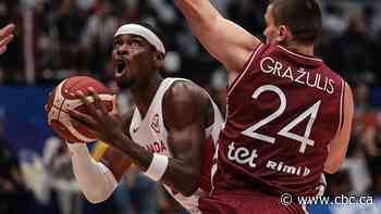 Canadian men upend Latvia to win group, stay unbeaten at basketball World Cup