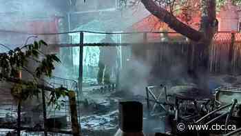 Fire at Regina encampment destroys tents and damages nearby fence, shed