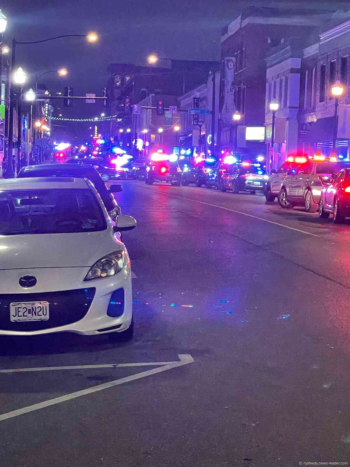 8 arrested downtown early Sunday. Police report window smashed and 'dancing' on police car