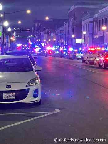 8 arrested downtown early Sunday. Police report window smashed and 'dancing' on police car
