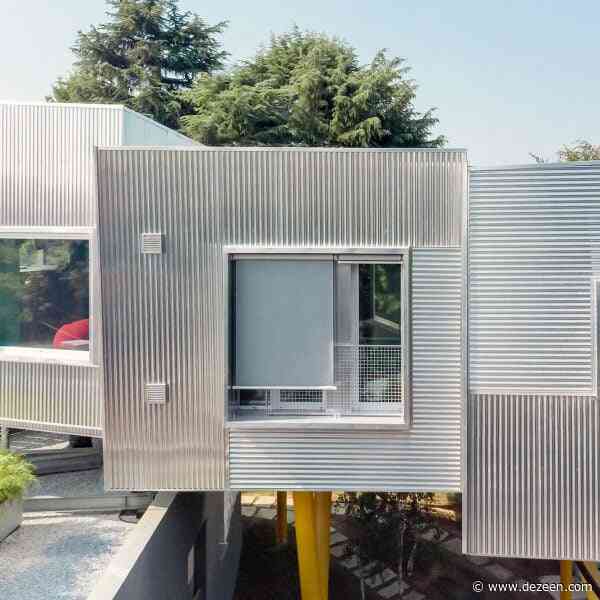 ElasticoFarm raises house on stilts around central void in Italian park