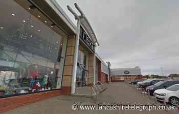 Man in his 30s dies at retail park after collapsing in Next