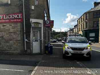 Two arrested as man stabbed outside off licence in Burnley