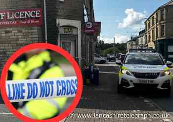Police cordon as man stabbed outside off licence in Burnley