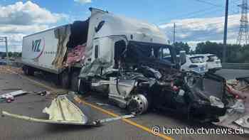 Cans scattered across Hwy. 401 east of Toronto after tractor-trailers collide