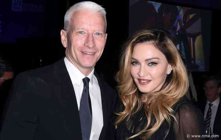 Anderson Cooper recalls “mortifying” experience of Madonna spanking and humping him on stage