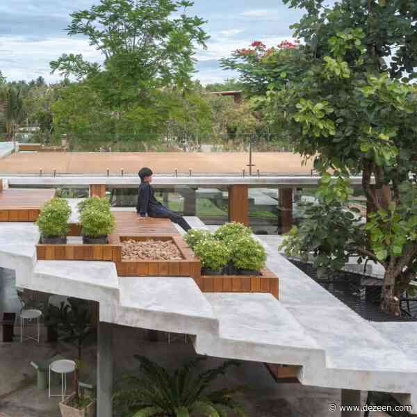 Looklen Architects sinks glass cafe into stepped circular landscape