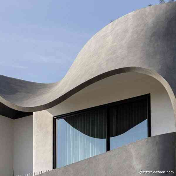 Studio Ardete wraps sculptural concrete ribbon around Indian home