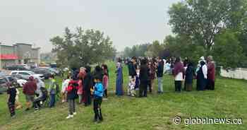 People wait overnight for free school supplies in Edmonton