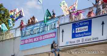 IAA-Gegner sorgen mit Abseilaktion für Stau in München