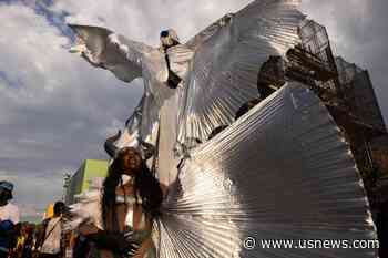 West Indian American Day Parade Steps off With Steel Bands, Colorful Costumes, Stilt Walkers