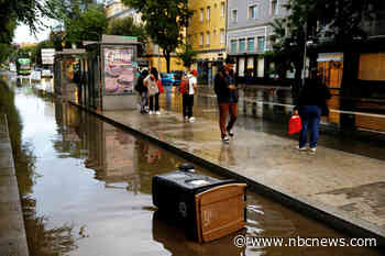 Heavy rain in Spain leaves two dead, two missing and people stuck on roofs