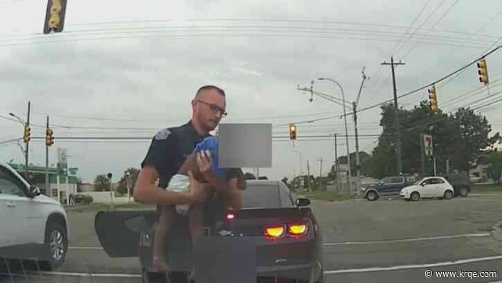 Video: Michigan officer saves toddler during traffic stop