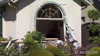Car crashes through bedroom of Clovis home