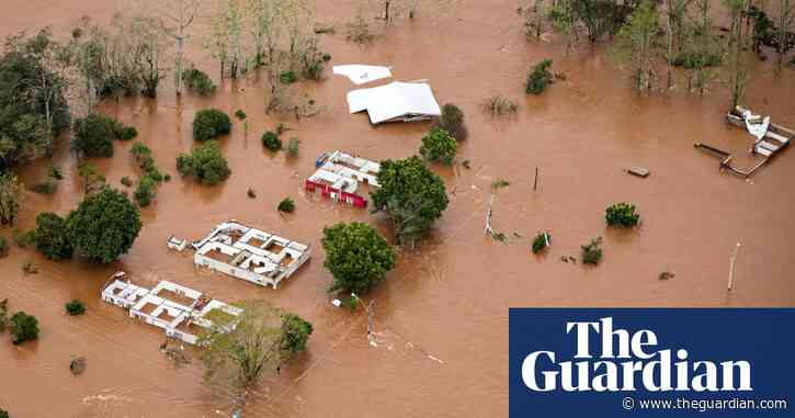 Floods submerge homes and leave at least 21 people dead in Brazil – video