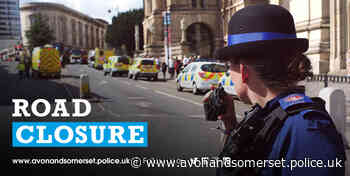 Driver injured in collision with a police car