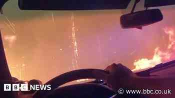 Video shows police officer escape from raging fire