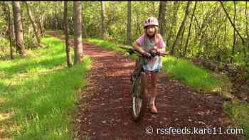 Crosby kids tackle trail at elementary school's new bike path