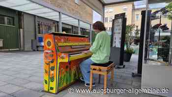 Die Musik der Straßenklaviere in Augsburg verbindet Menschen