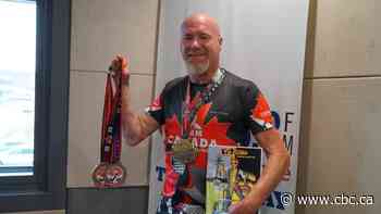 Thunder Bay arm-wrestler who nearly lost both arms prepares to defend world titles in Malaysia