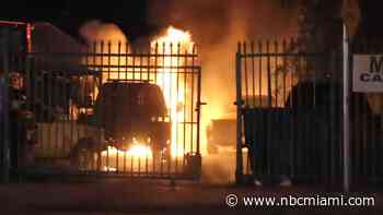Crews battle early morning blaze after car is engulfed in flames outside Miami mechanic shop