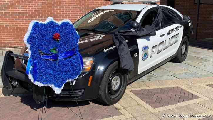 Memorial grows outside Hartford police department for fallen officer Robert “Bobby” Garten