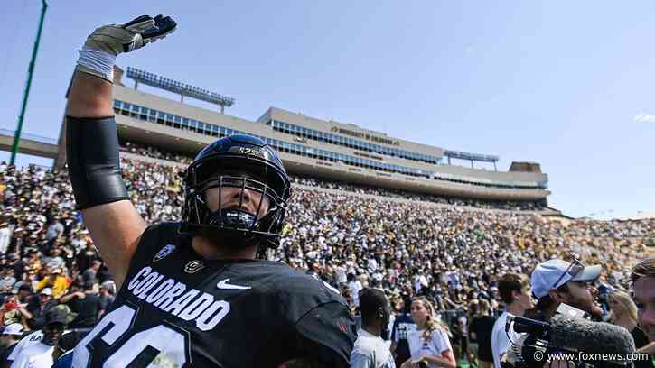 Colorado fans storm field after Deion Sanders' win over Nebraska; Shedeur breaks out dad's touchdown dance